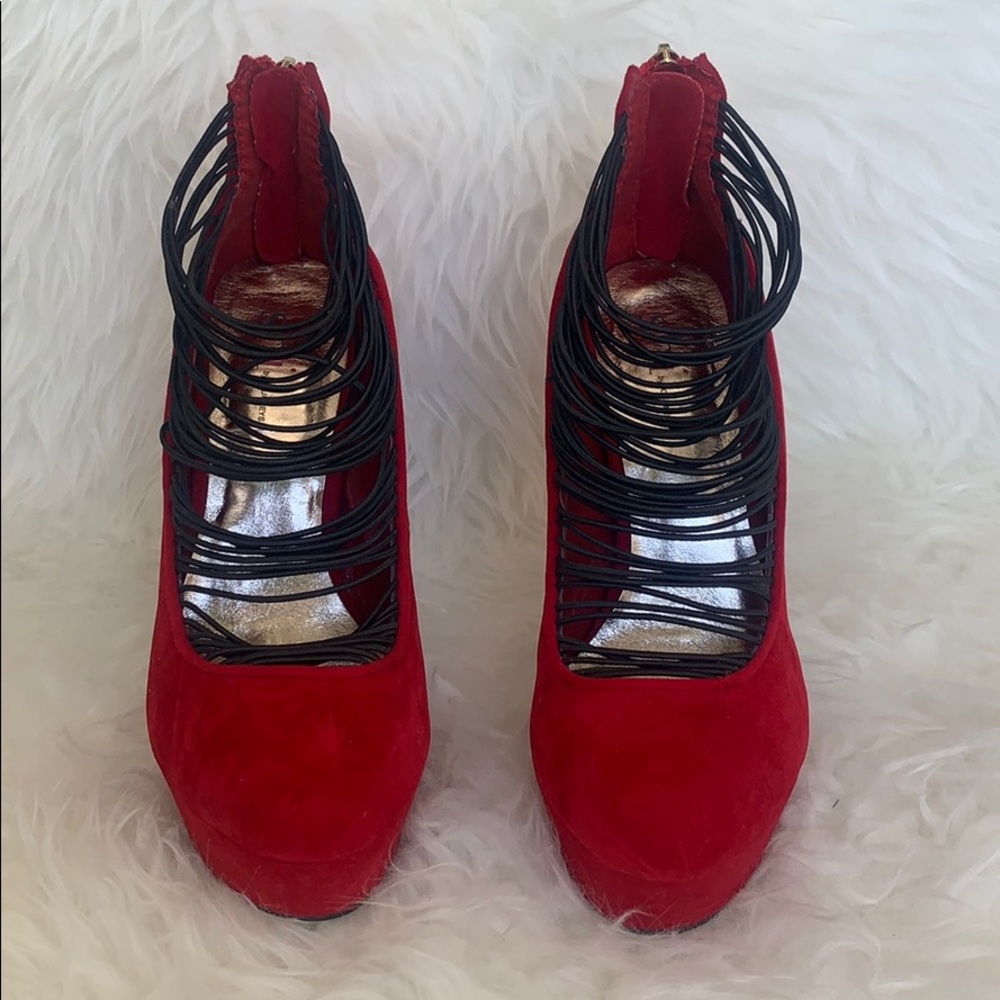 Hot red stiletto platform pumps